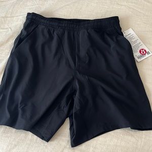 Lululemon, size medium black shorts (pace breaker short 7” lined) never worn,